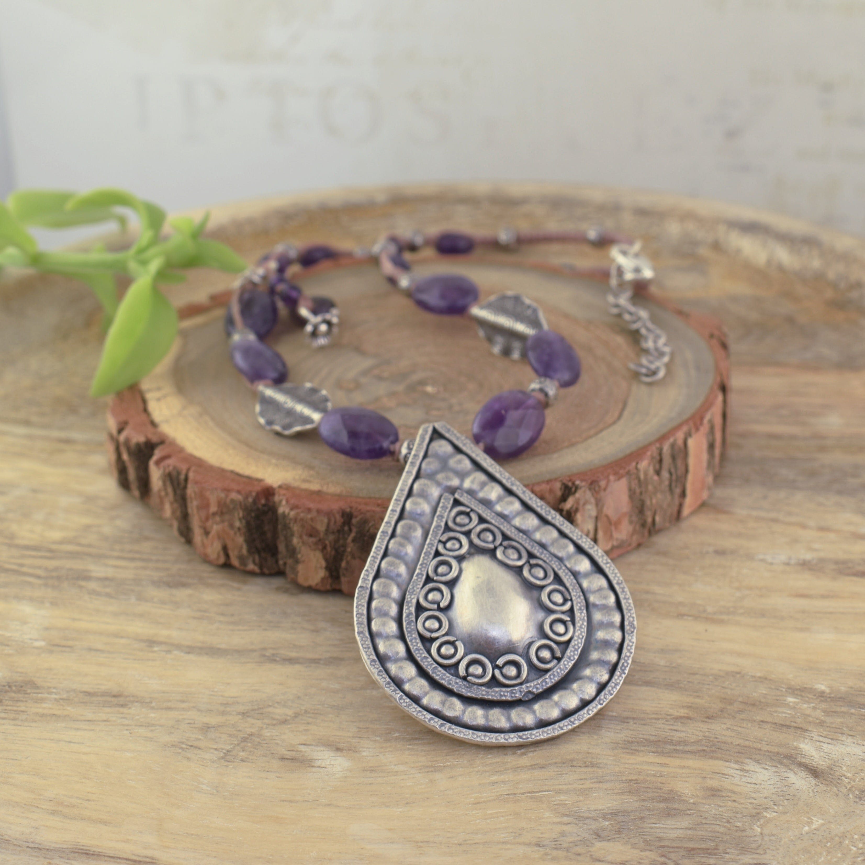 17-19" adjustable necklace with amethyst beads and chunky silver teardrop pendant