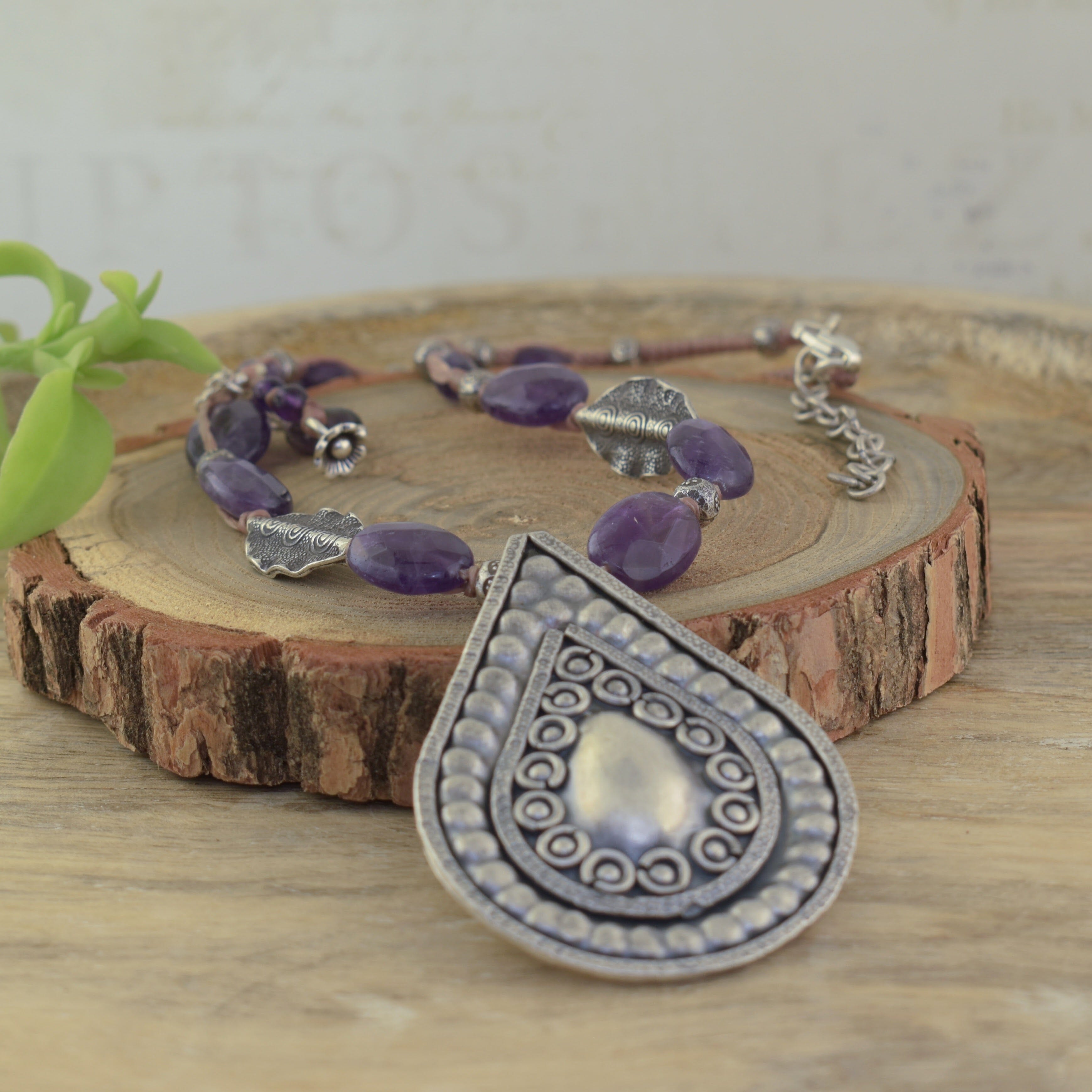 decorated teardrop necklace in sterling silver with amethyst beads