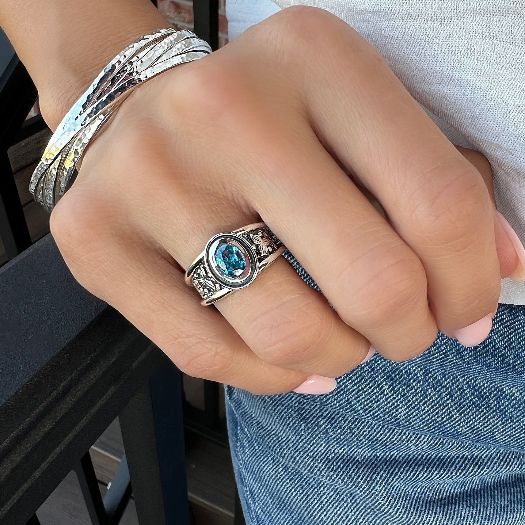 Blue topaz sterling silver ring, Blue bay paired with multiple band bangle, the falls