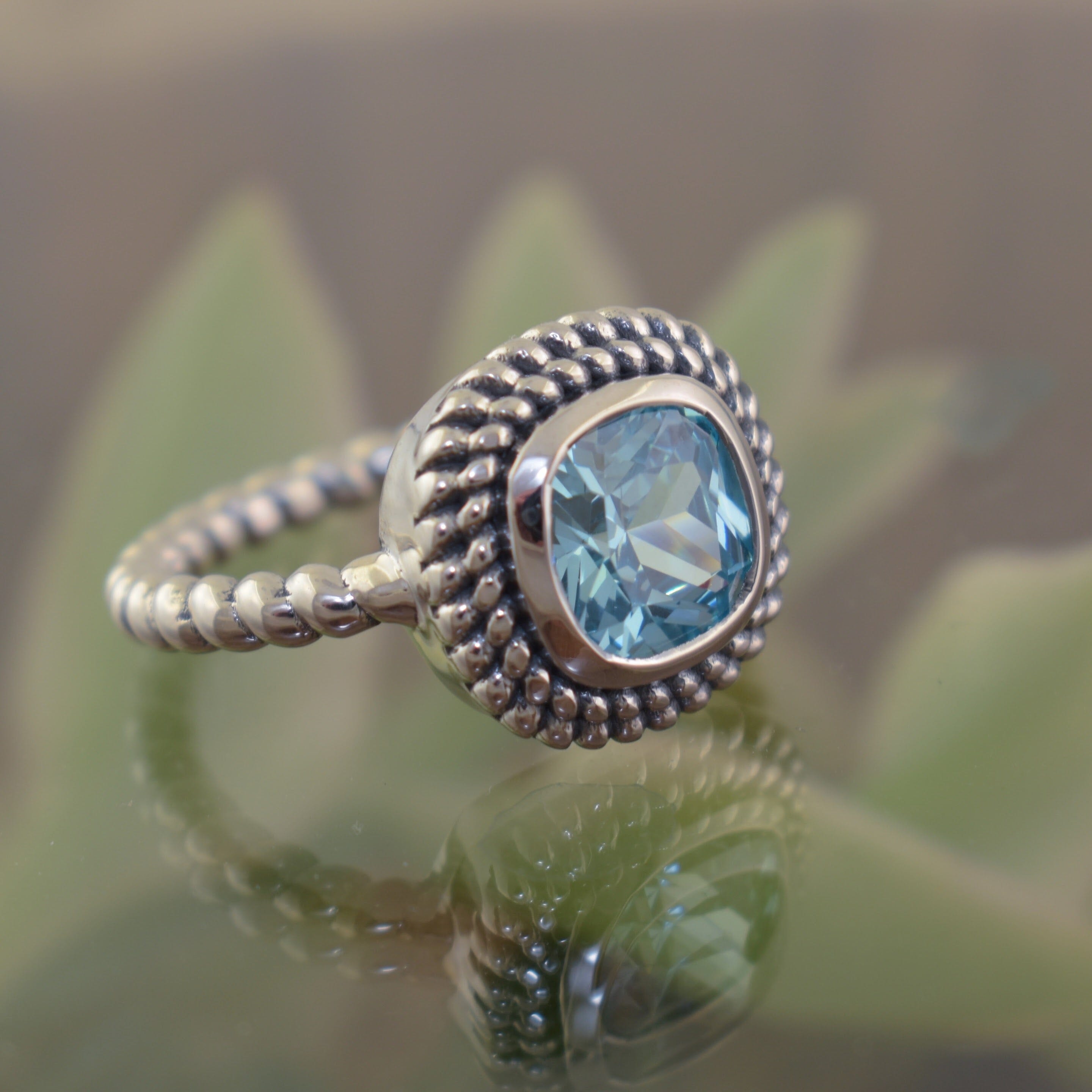 .925 sterling silver ring with cushion genuine blue topaz stone