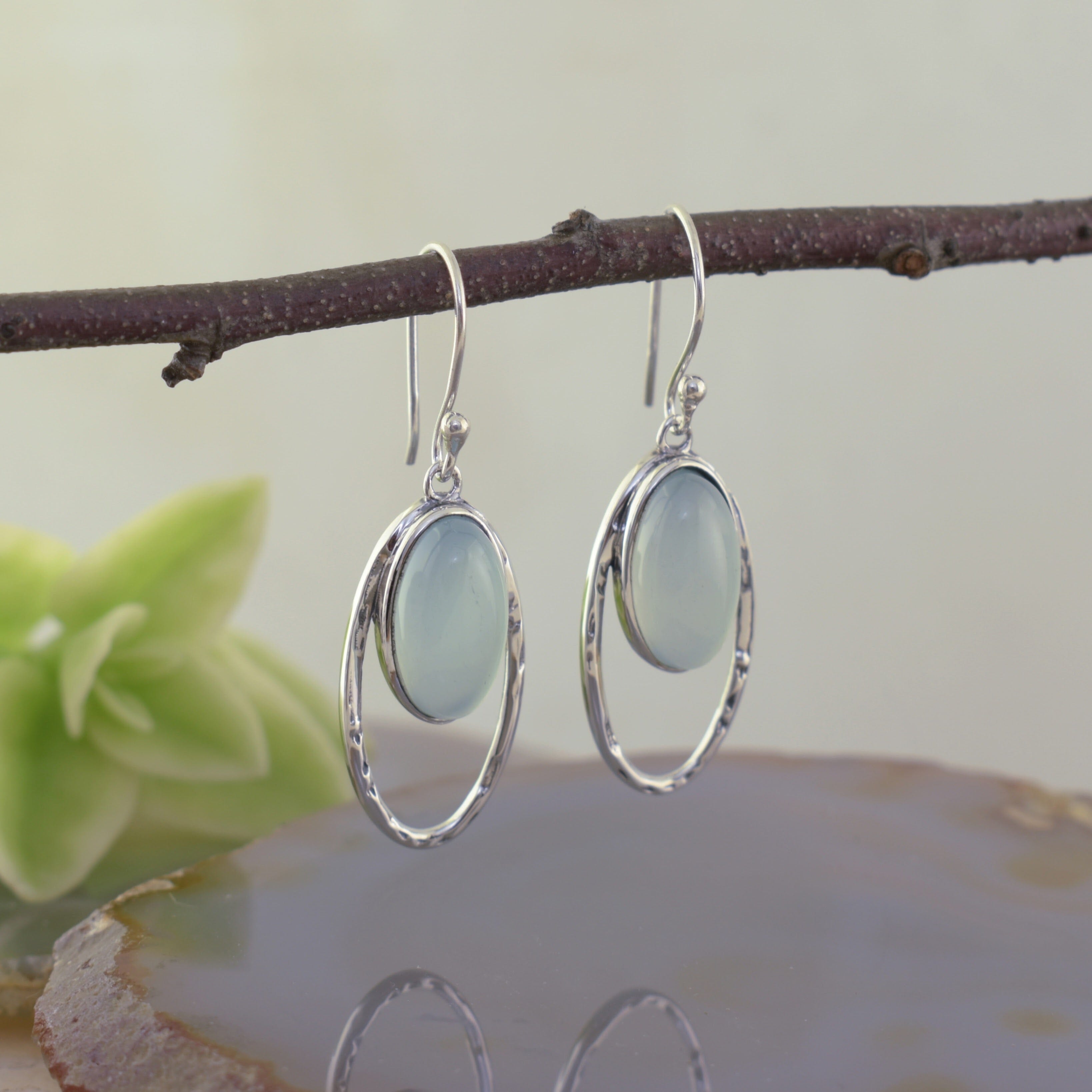 Soft green aqua dangle earrings set in .925 sterling silver