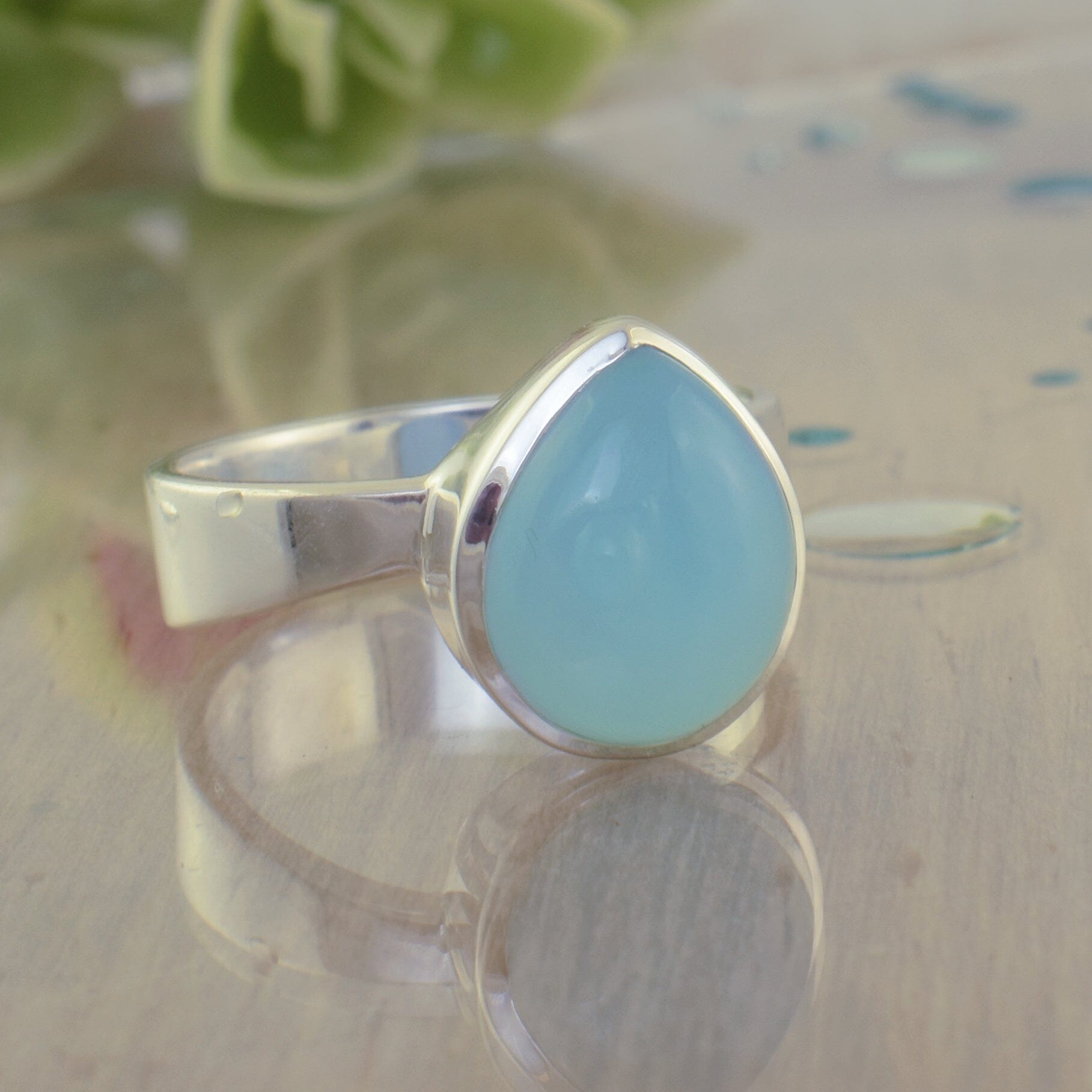 unique sterling silver teardrop shaped ring with blue chalcedony center