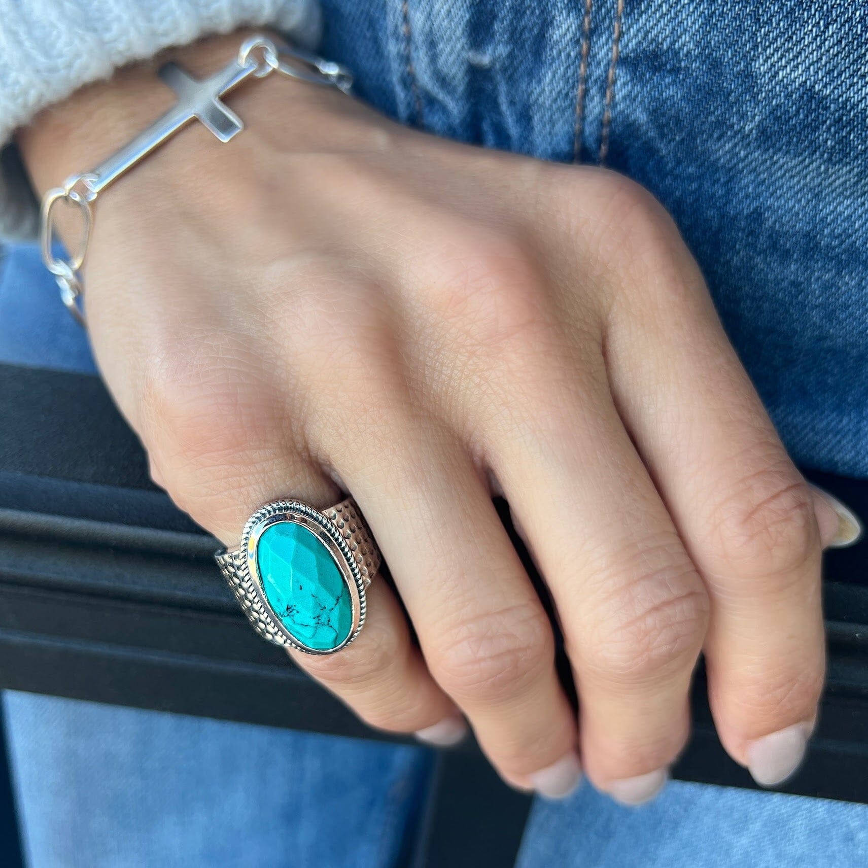 chunky western style pinky ring with intricate silver details