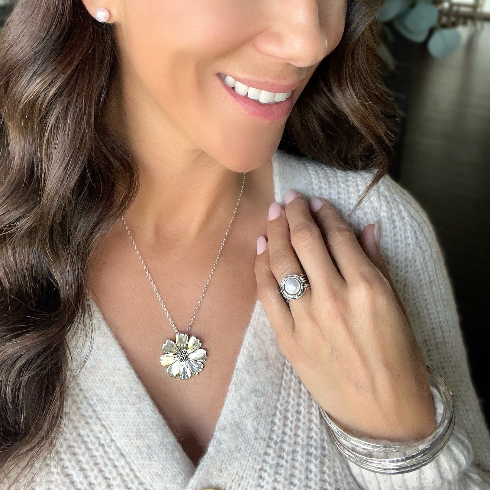 flower sterling silver necklace paired with ella ring, the falls bangle and bay shore earrings