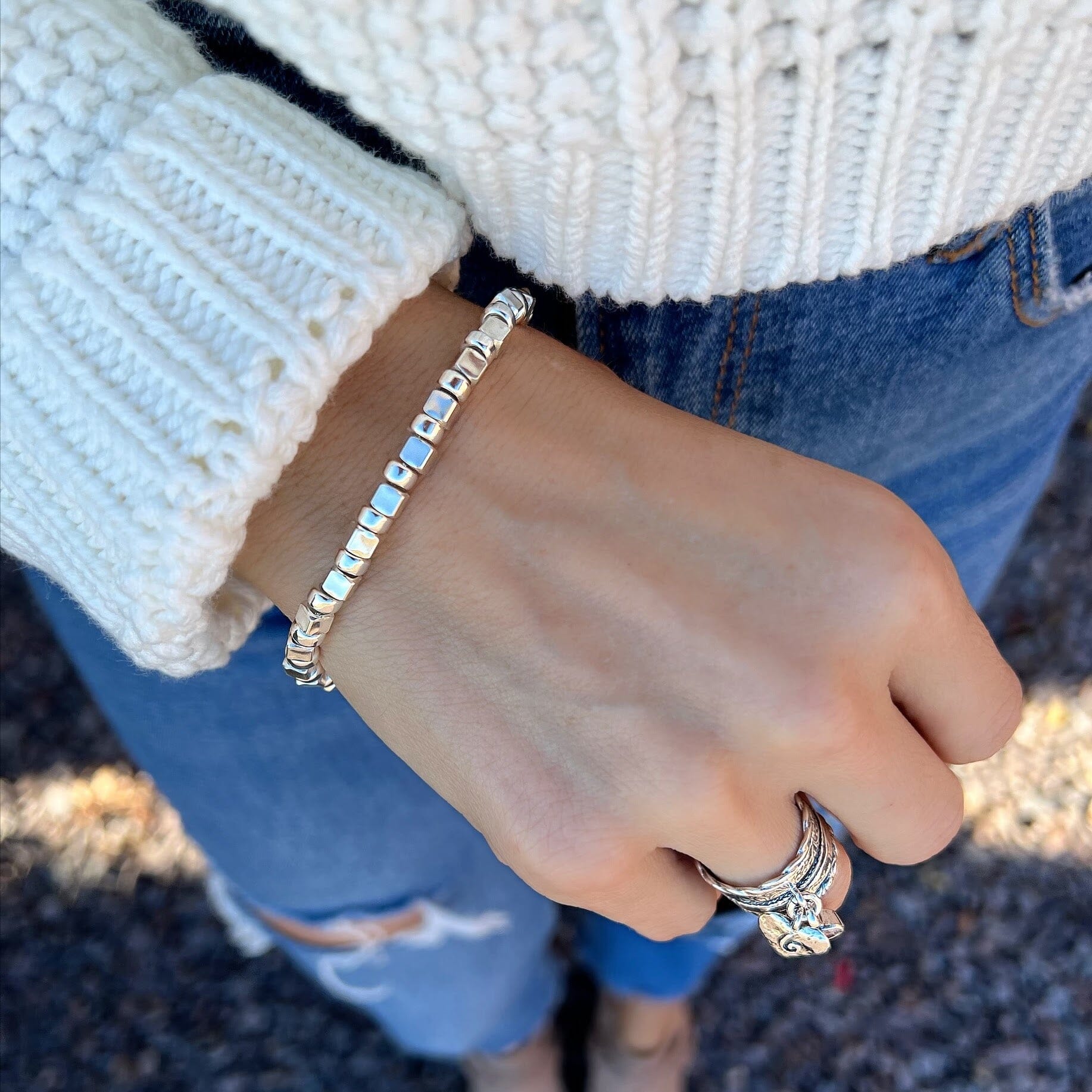 sterling silver bracelet featuring cube and oval beads