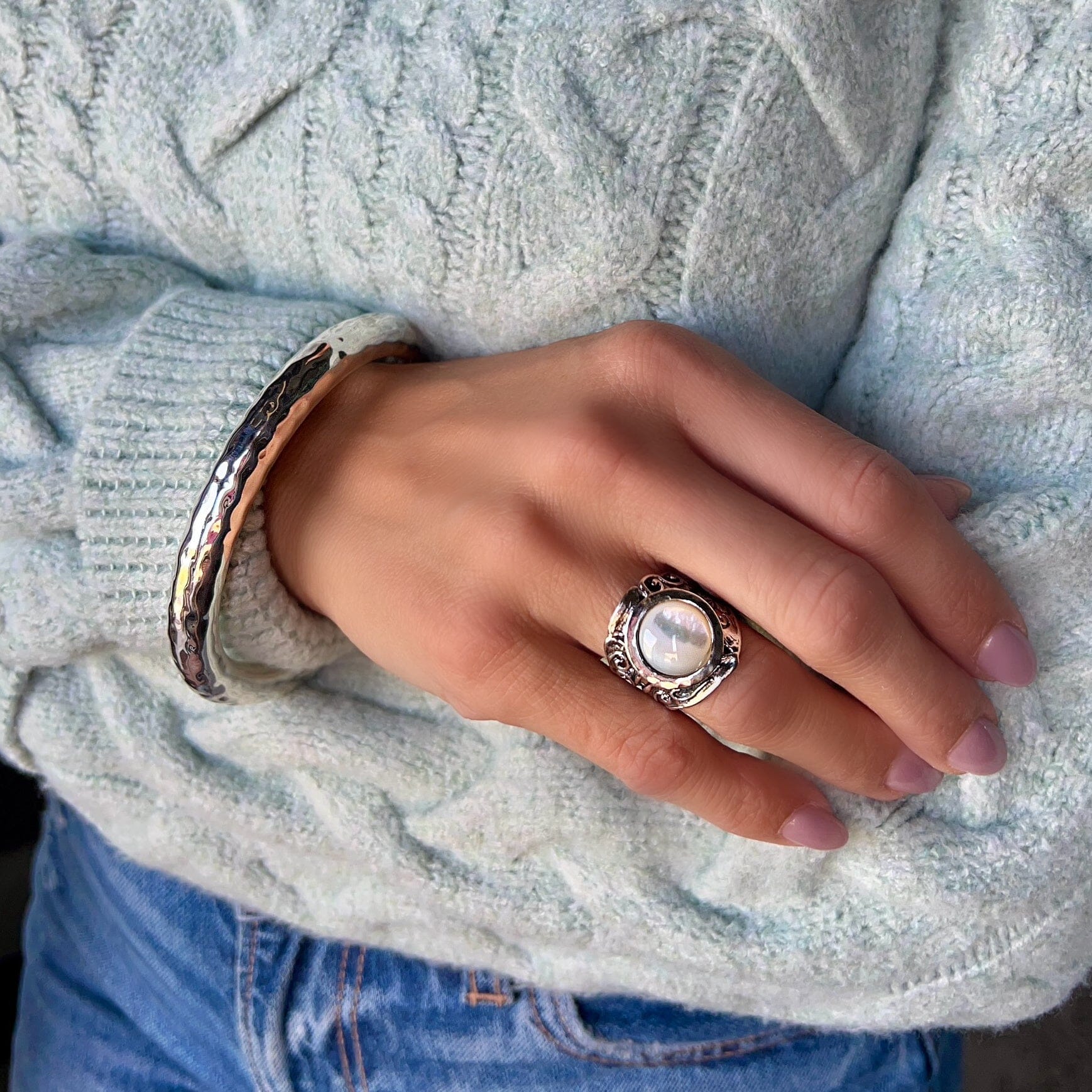 unique sterling silver ring featuring a pearl set in the center of the ring paired with the sonoma bangle