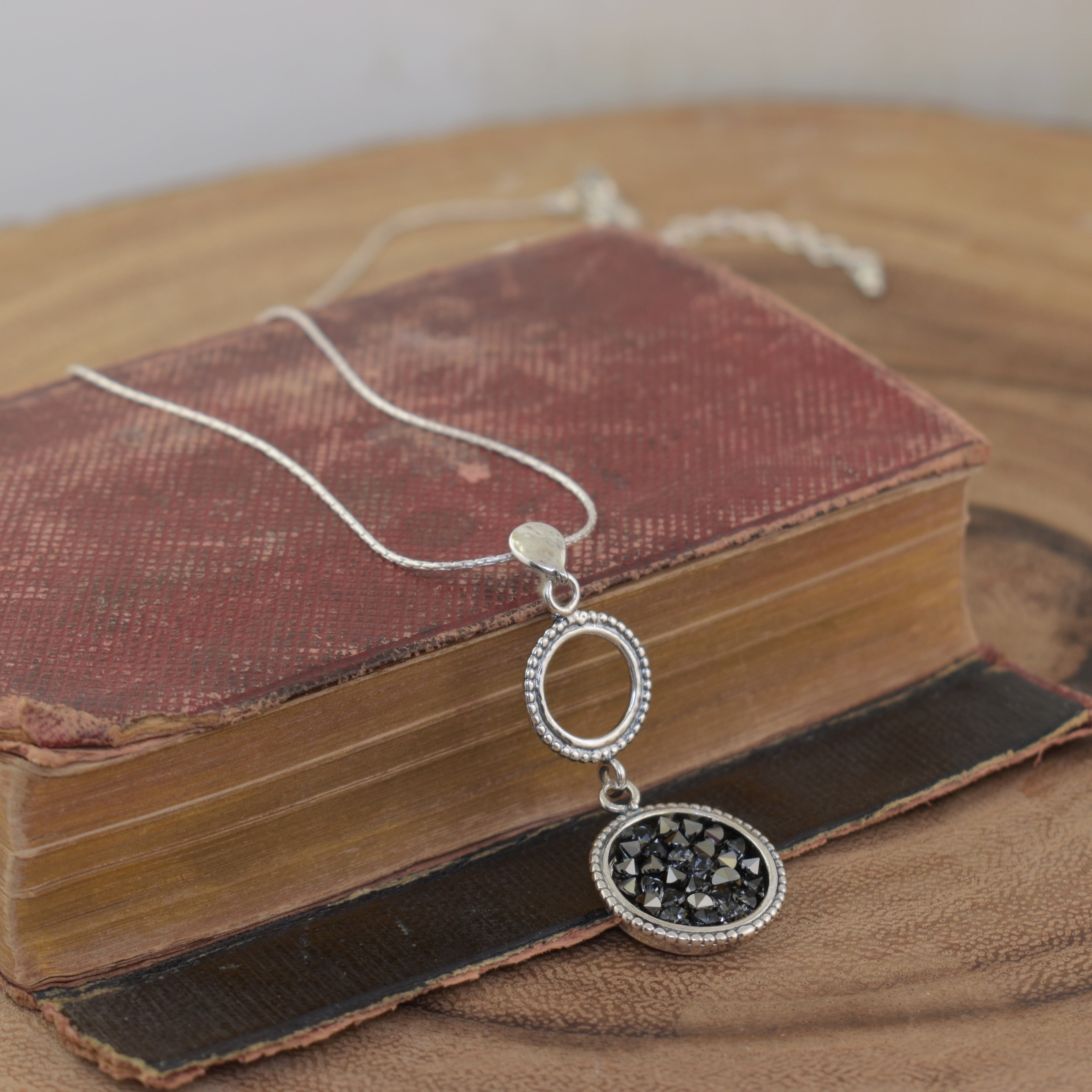 Designer sterling silver necklace featuring black Austrian Crystals