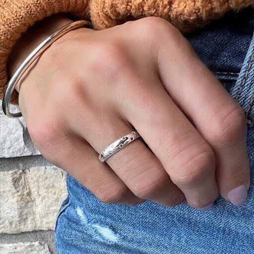 simple sterling silver ring with golden cz stones. 