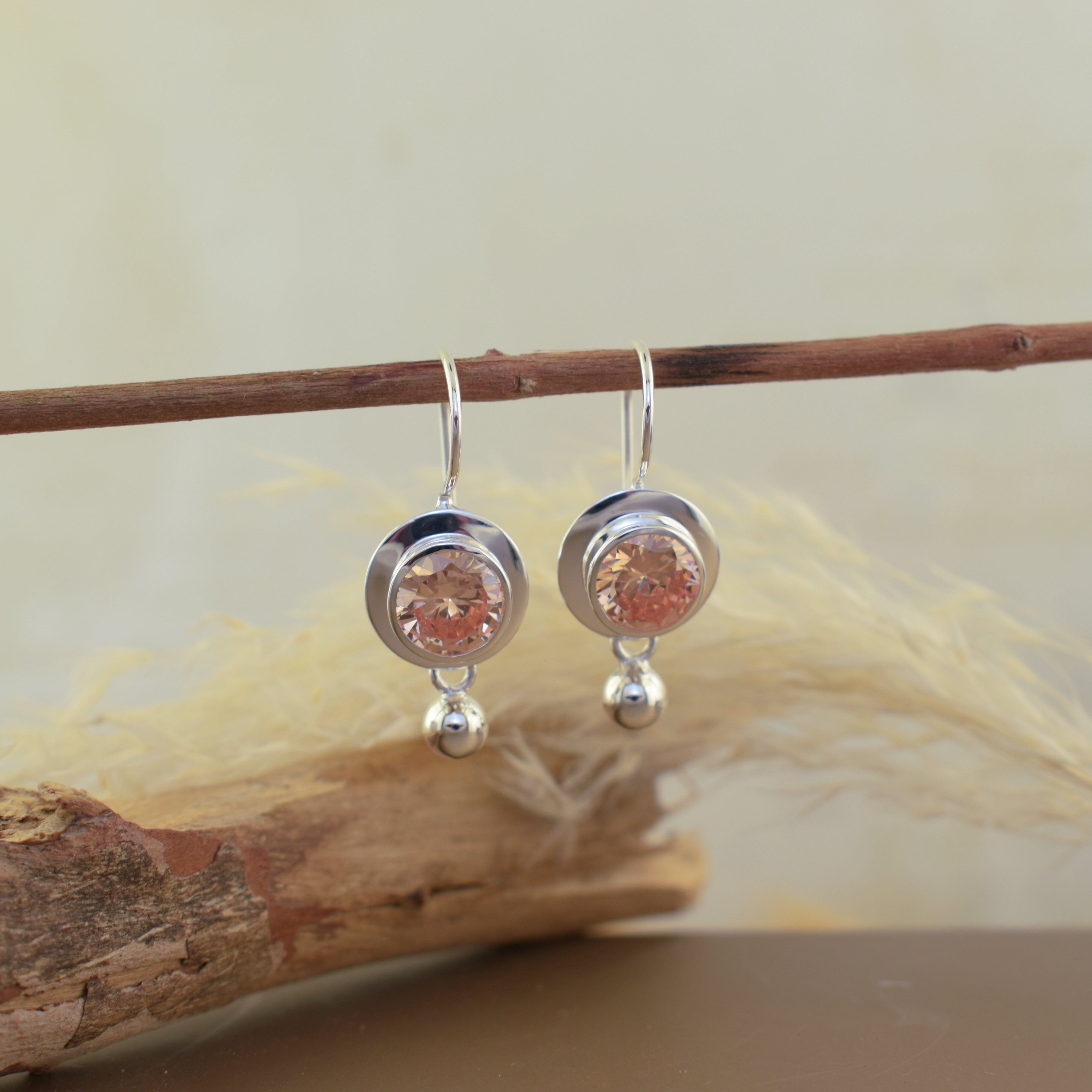 Honey-color sterling silver earrings on French hooks