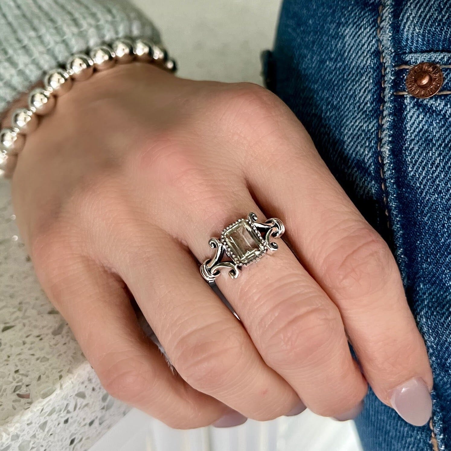 antique silver ring featuring soft green amethyst