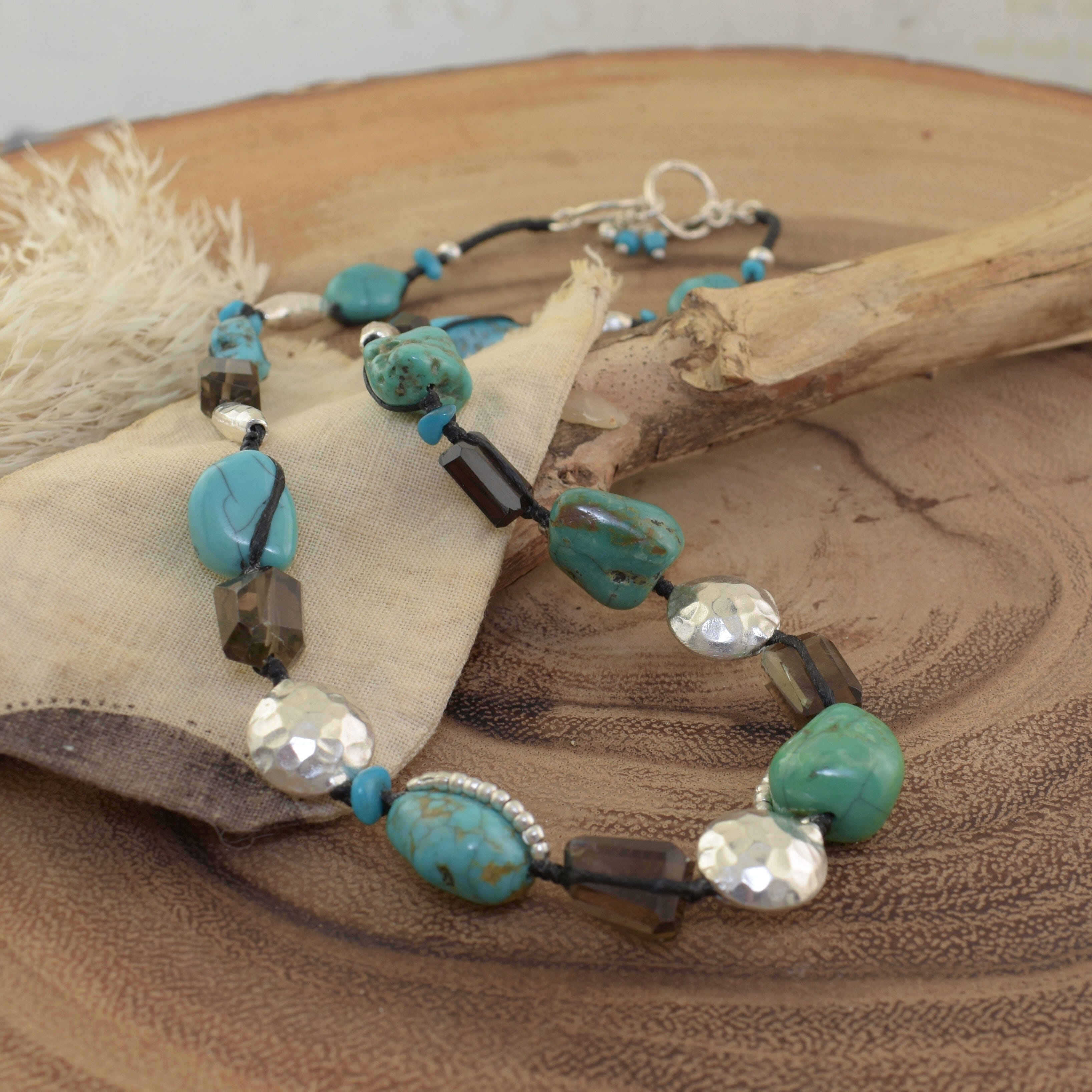 Southwest-style necklace featuring sterling silver beads, Smoky Quartz and Reconstructed Turquoise