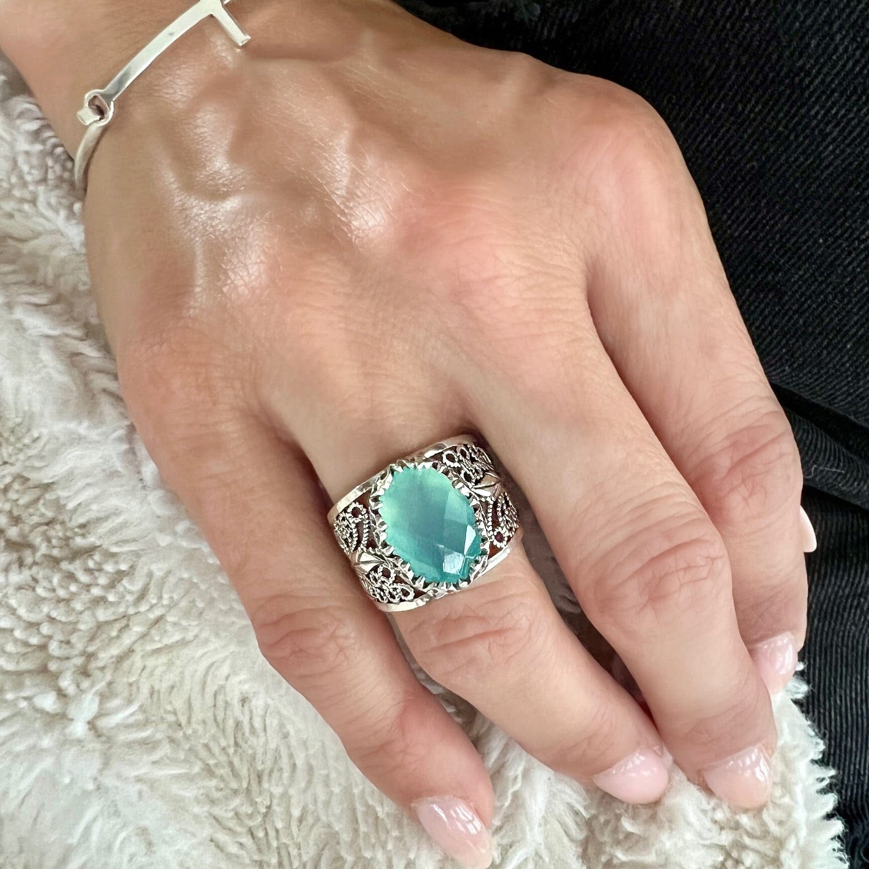 chunky silver filigree ring with large oval chalcedony stone