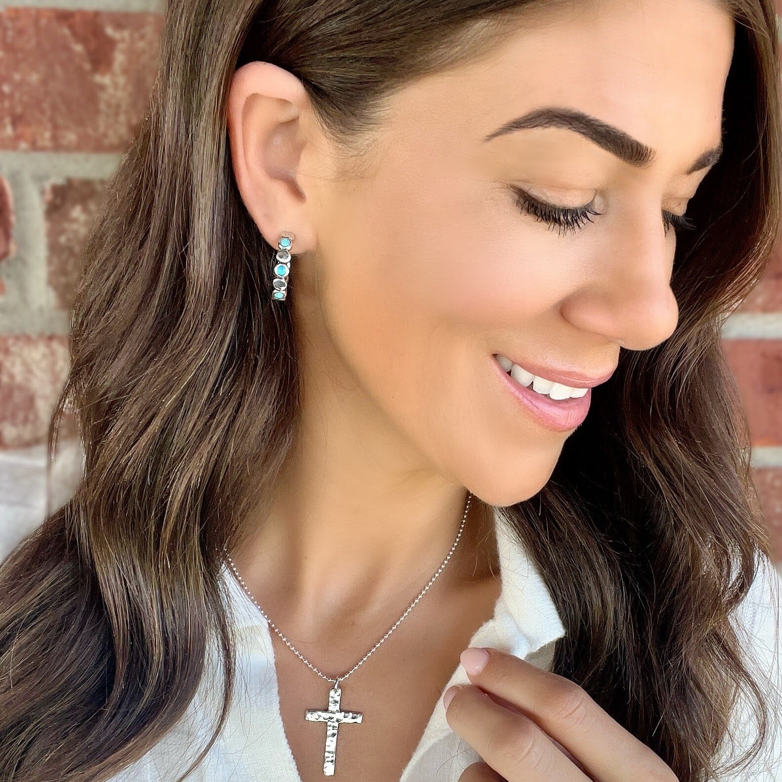 sterling silver hoop earrings with an alternating pattern paired with cherished one necklace.