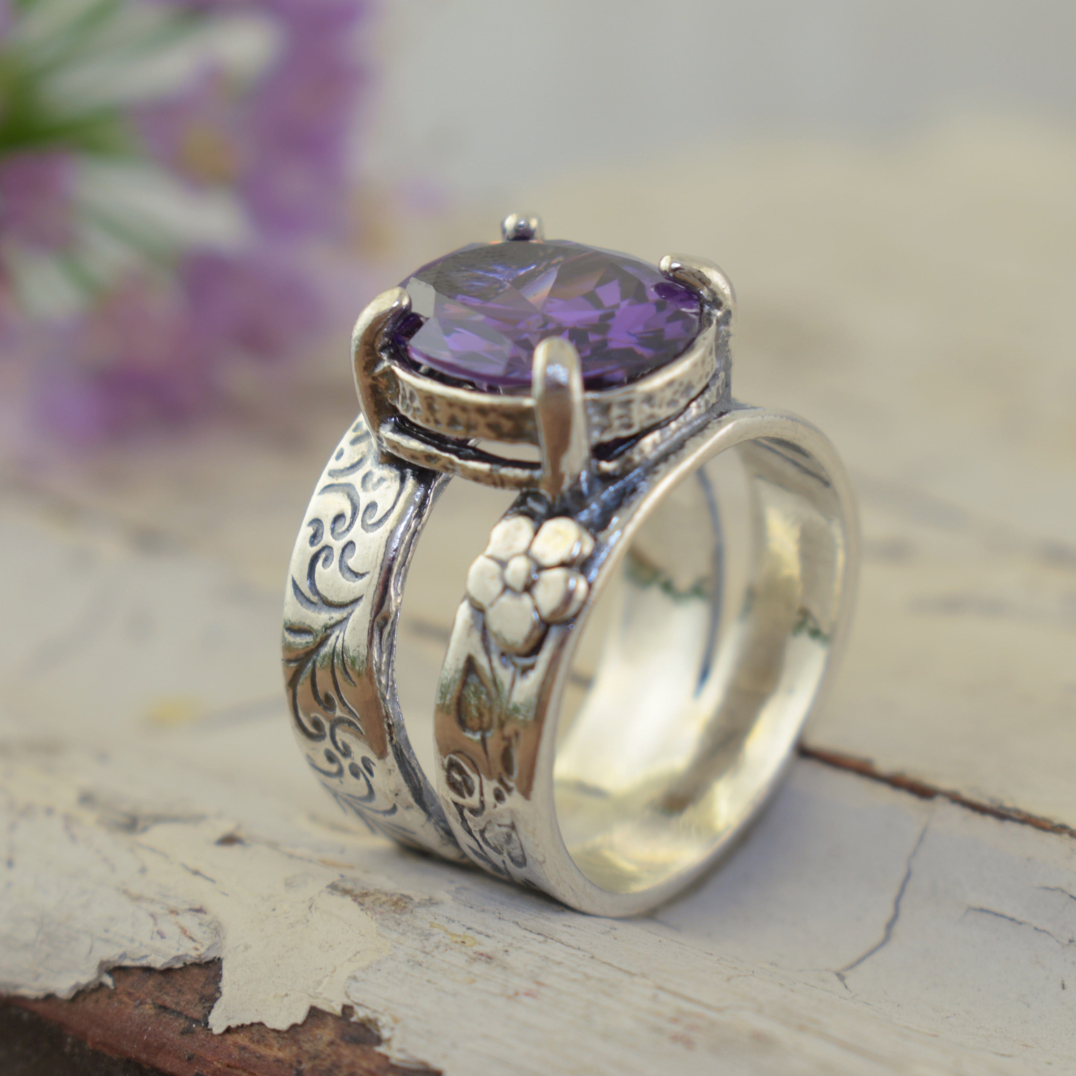 Designer sterling silver and amethyst CZ ring with flower accented band