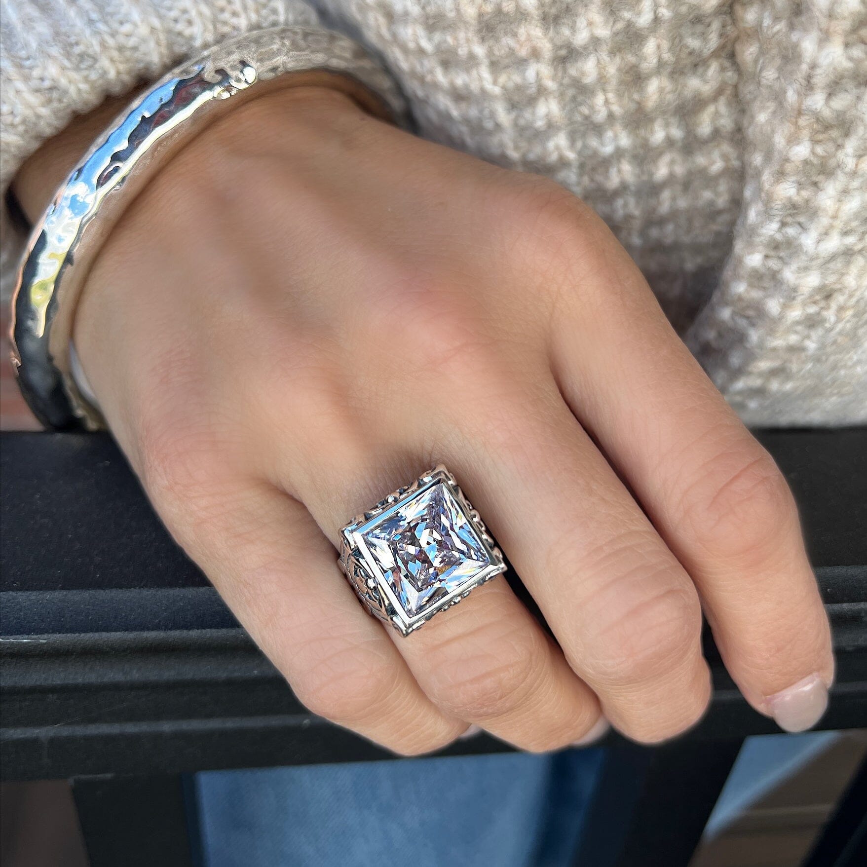 large sterling silver ring featuring a square cz stone paired with the sonoma bangle