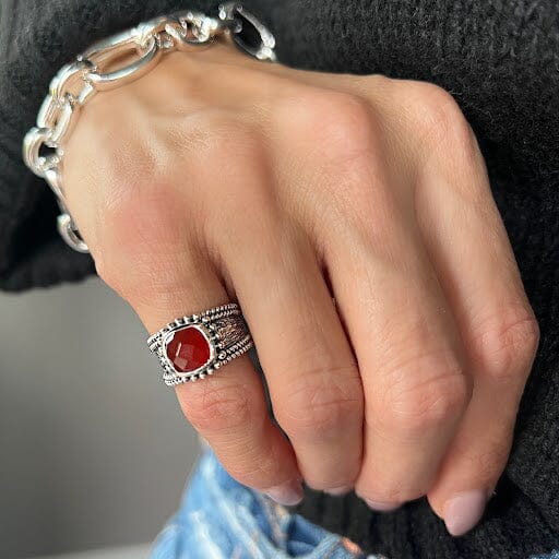 Summer Sunset carnelian pinky ring with a high polished and oxidized finish