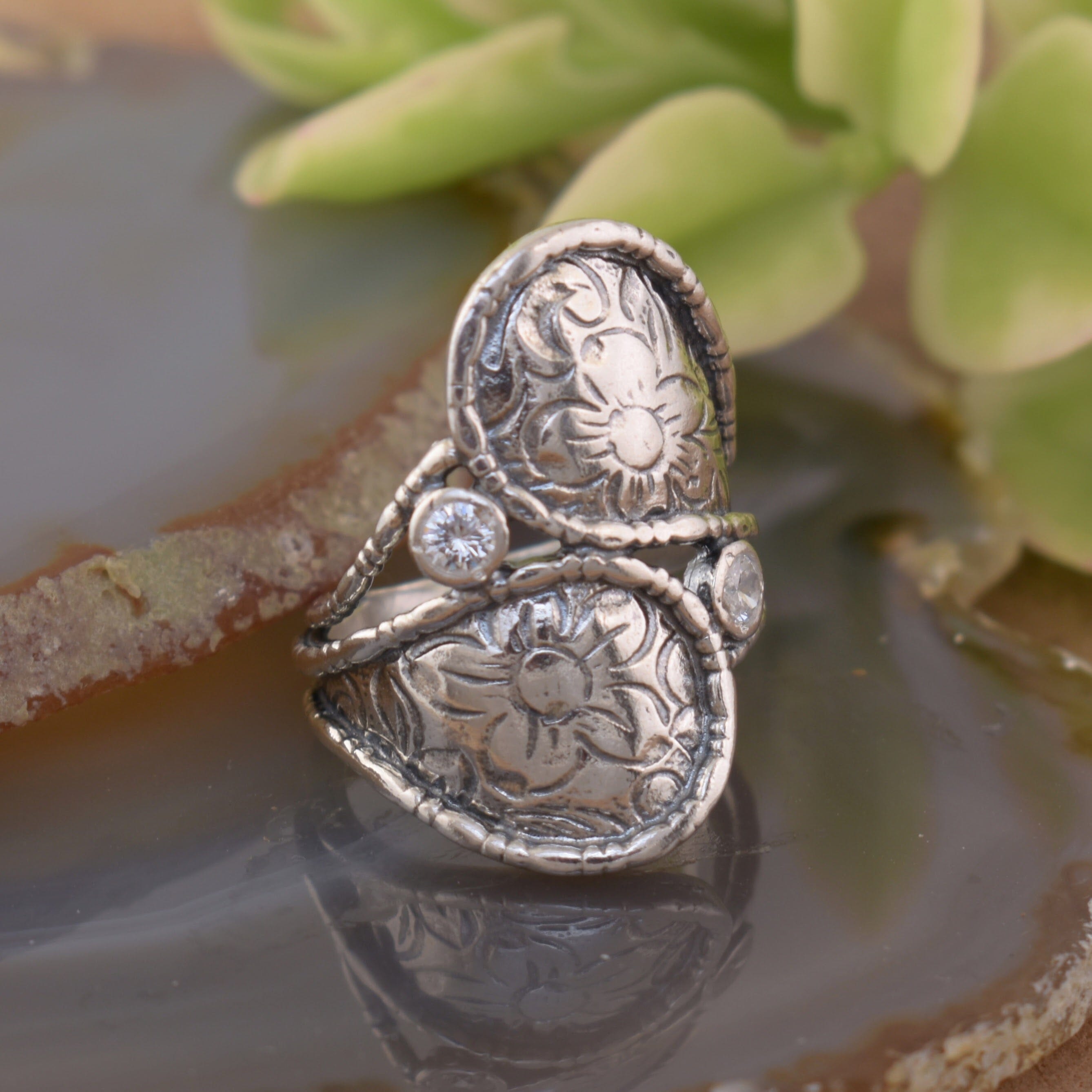 .925 sterling silver flower texture ring with round cz accents