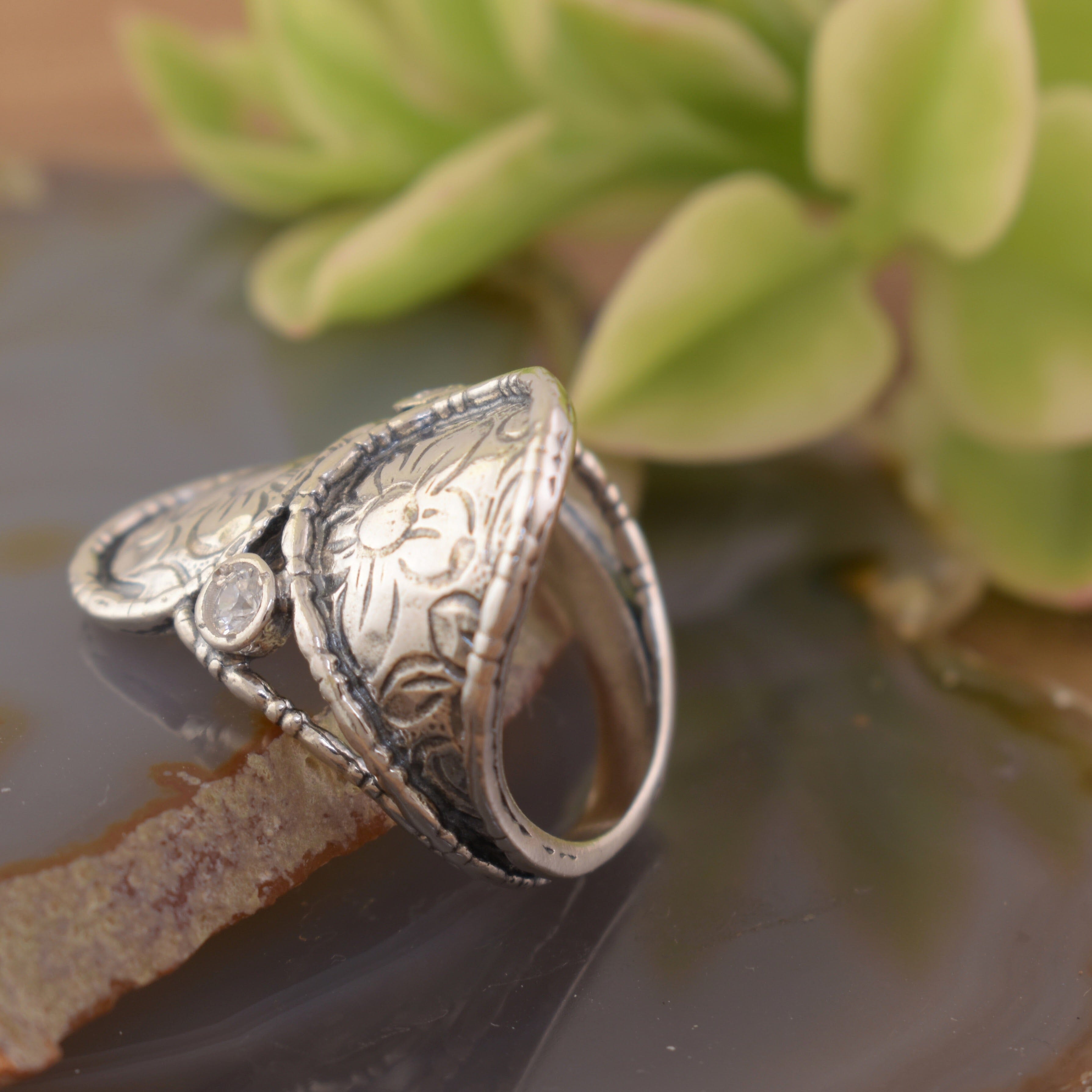 Sterling silver and CZ spoon-style wide band ring