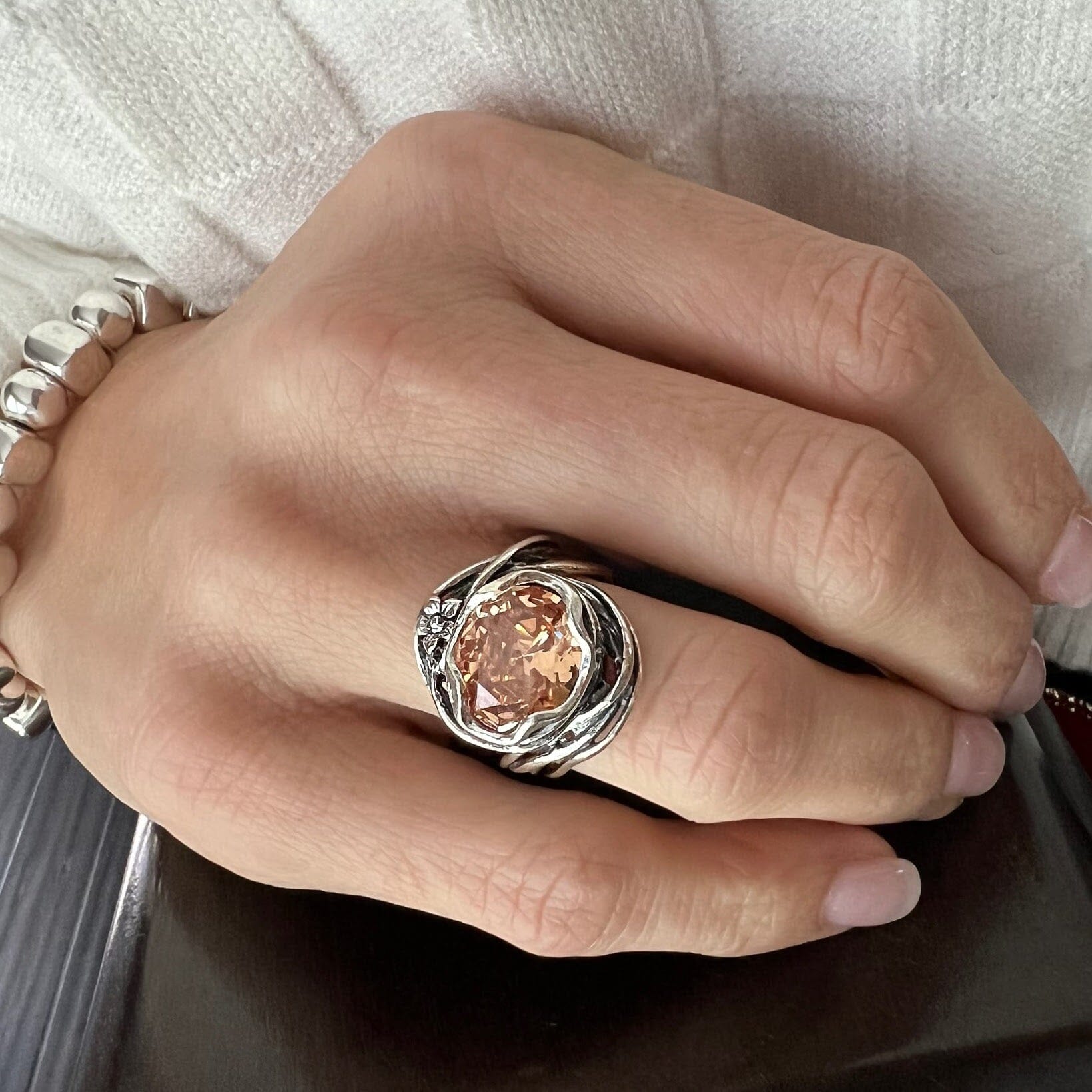 Butterscotch Bliss Ring paired with a silver beaded bracelet