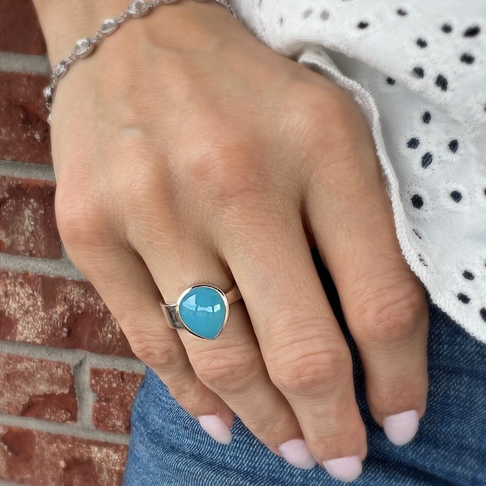 pear shaped chalcedony ring with unique band