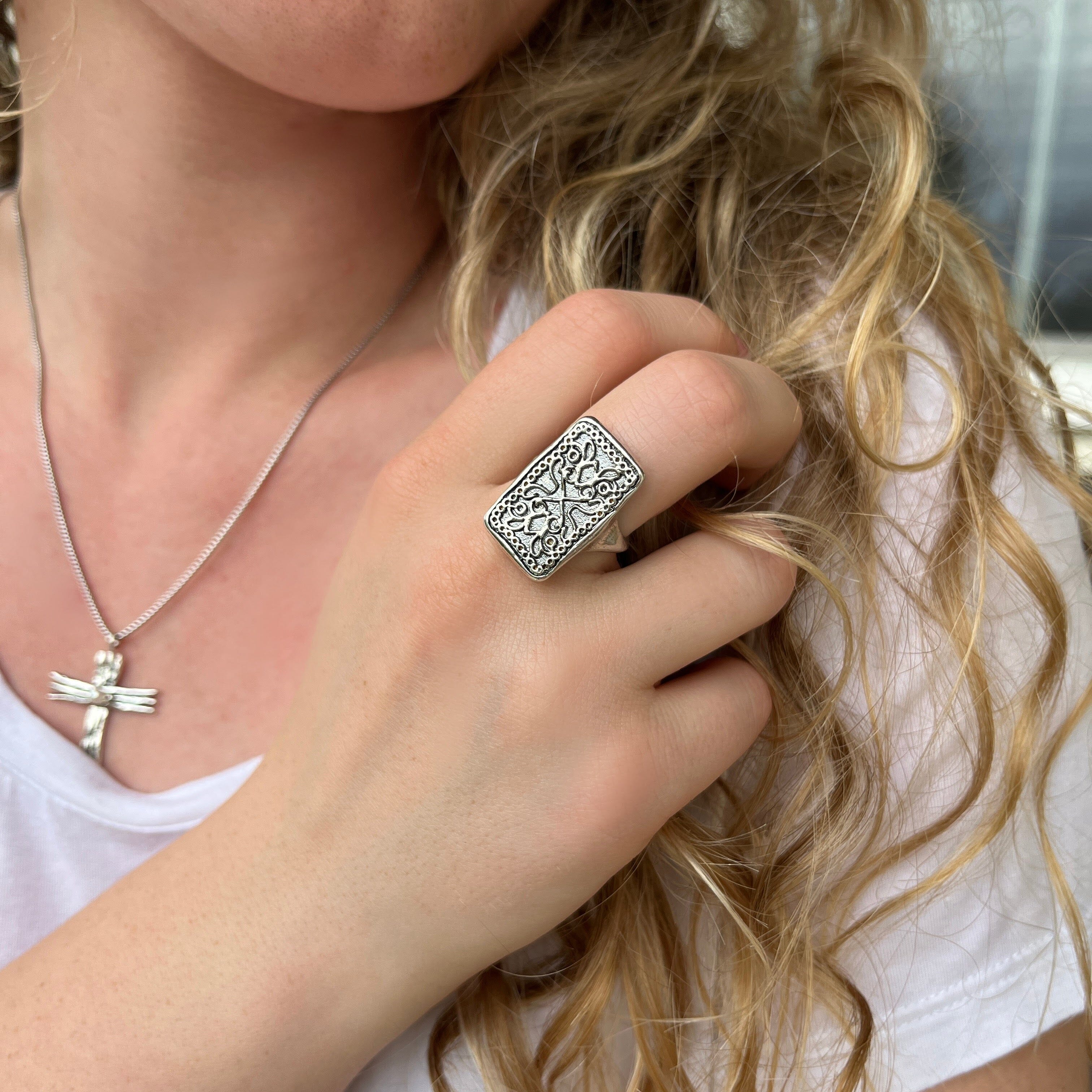 sterling silver rectangle ring with a unique pattern.