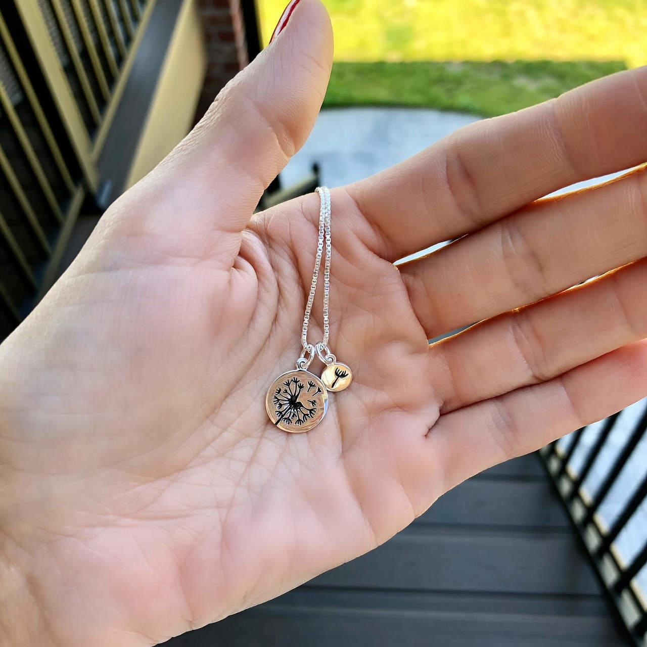 Handcrafted sterling silver necklace with dandelion