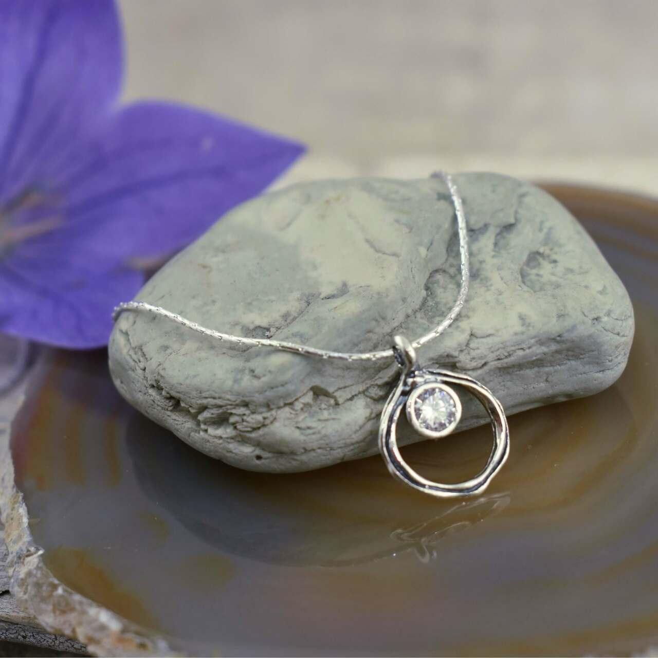 Sterling silver circle necklace with cubic zirconia stone