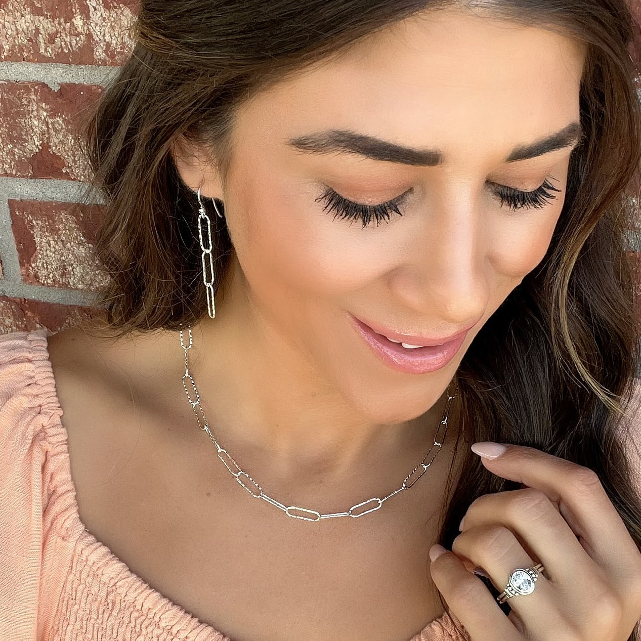 Hammered Paperclip Earrings modeled with the matching chain and My Fair Lady ring