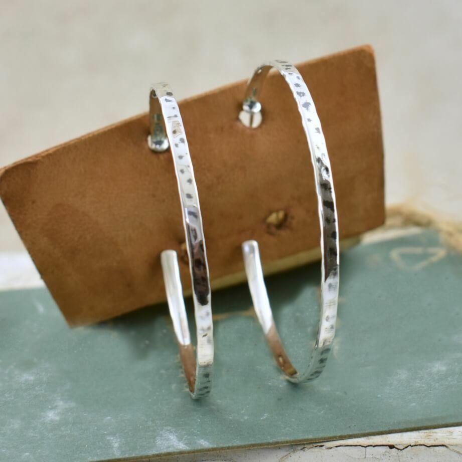 Post style large hammered hoop earrings