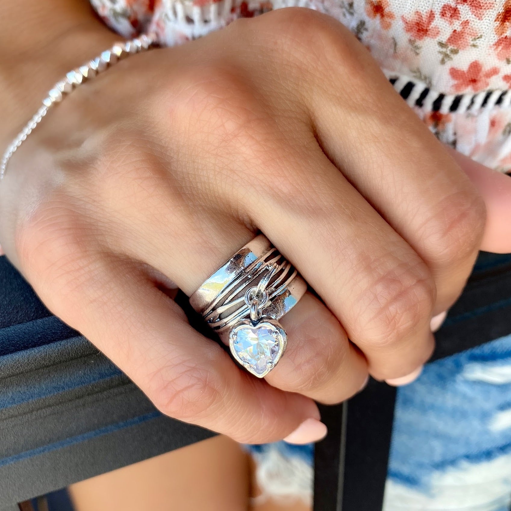 sterling silver wide ring with dangling cz heart