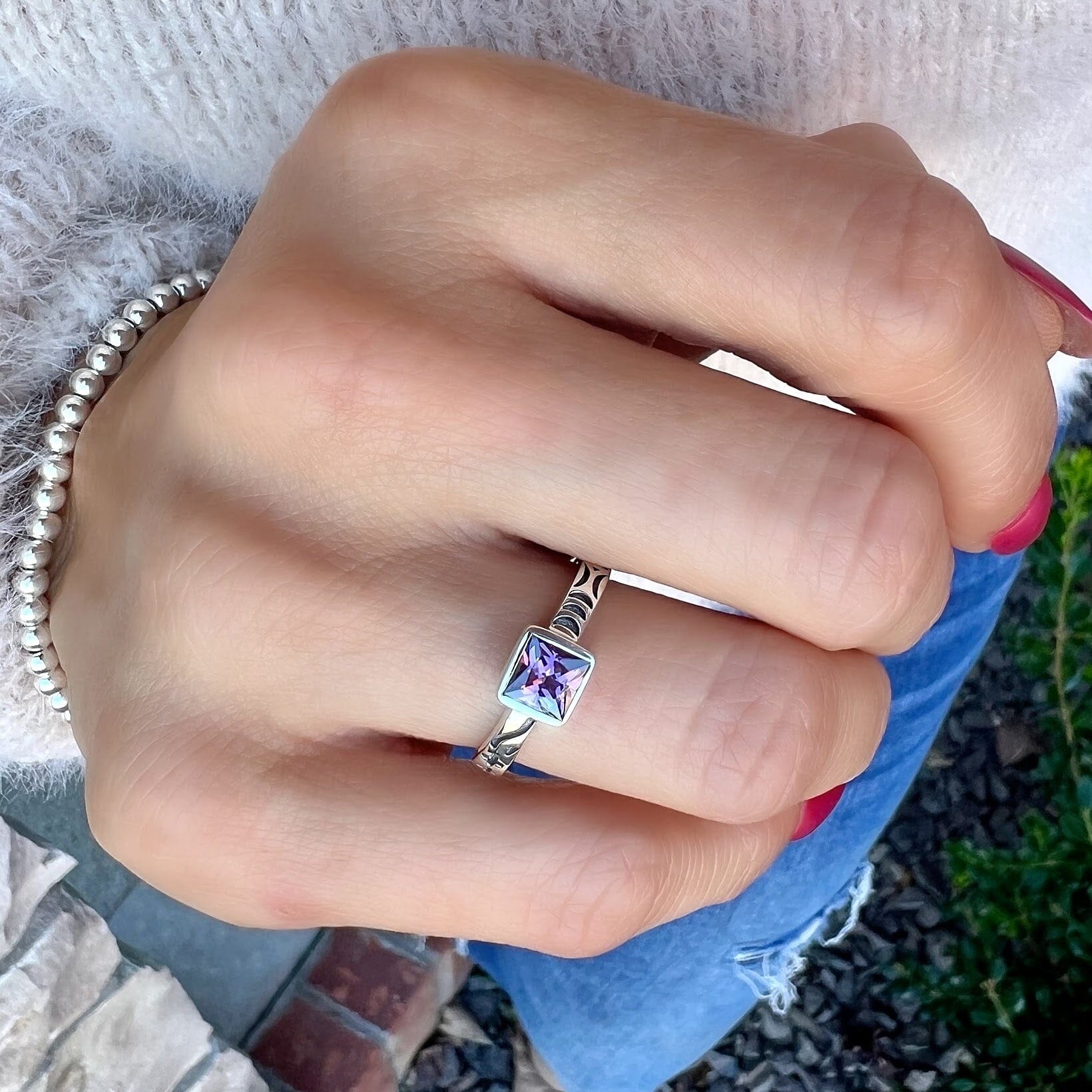 Sugarplum Ring paired with a dainty beaded bracelet